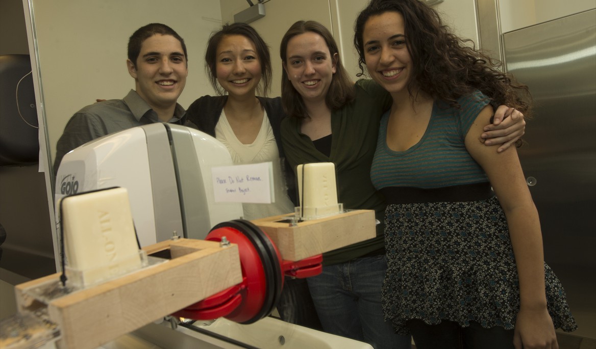 Freshmen create unique soap dispenser out of a cheese grater to be installed in a local restaurant