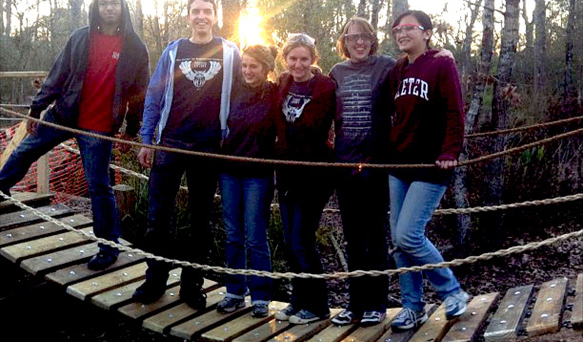 Students build a bridge for a playground at the Houston Arboretum